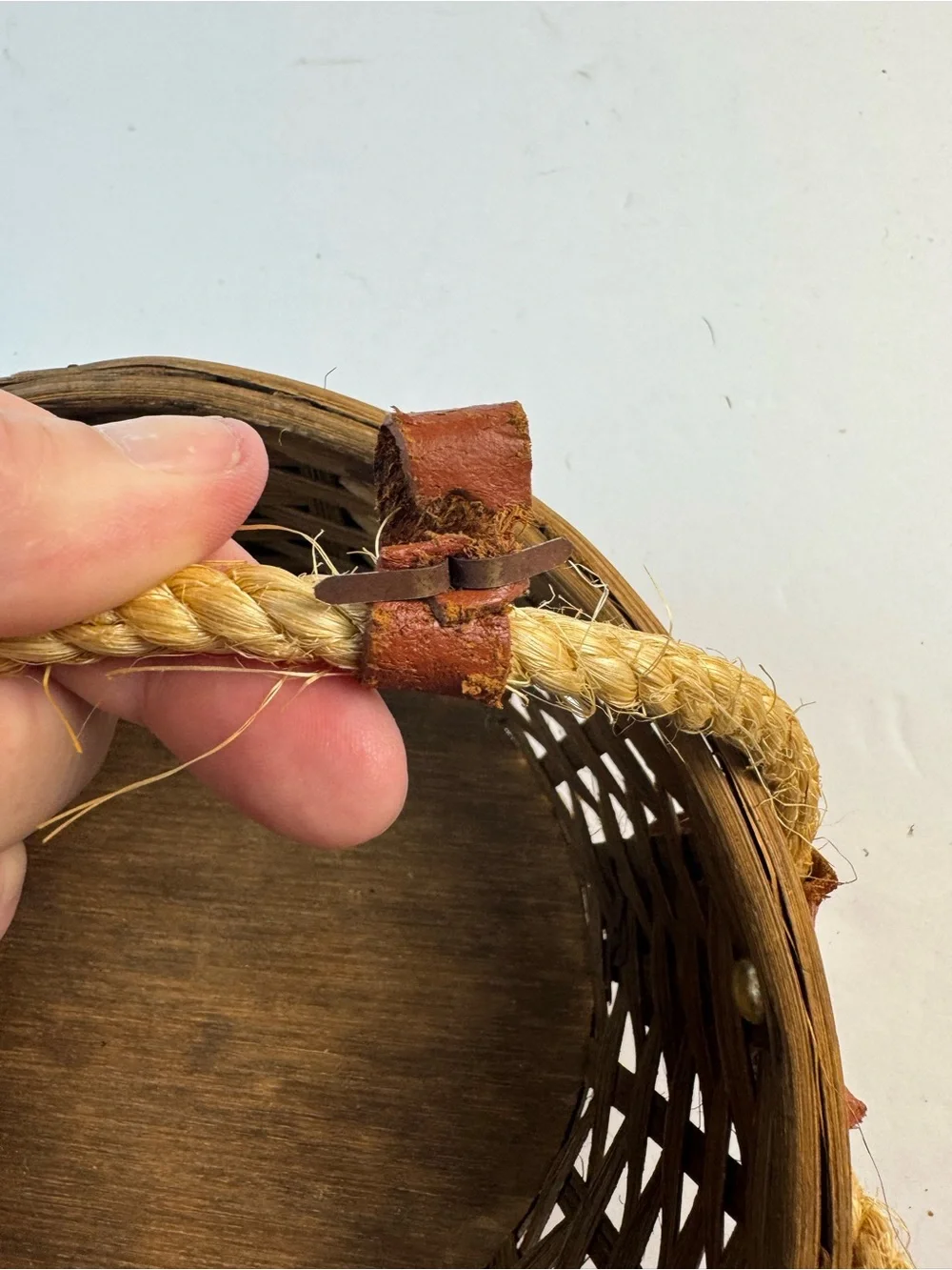 Vintage mid-centuryWoven Straw basket with Brown Leather Panels and Rope Handle